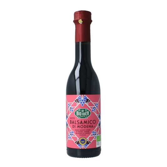 Bioidea Balsamico azijn bio, 250ml, in a glass bottle, showing the dark, rich balsamic vinegar used as a flavorful sauce or condiment.