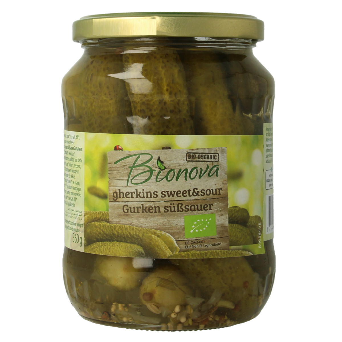 Bionova sweet and sour organic pickled cucumbers in 670g jar, surrounded by fresh vegetables and fruits.