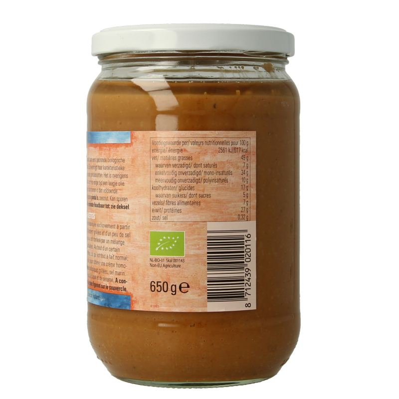 Jori organic peanut butter with salt in 650g jar, spread on bread, showing creamy texture and label.