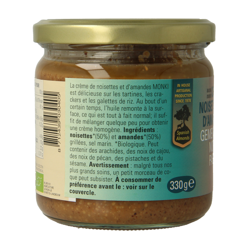 Monki organic mixed nut paste with salt, 330g, spread on bread, showing a jar of Monki broodbeleg with a creamy texture and nut pieces