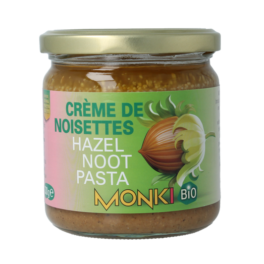 Organic Monki hazelnut spread on bread, 330g jar, natural and creamy with a smooth texture.