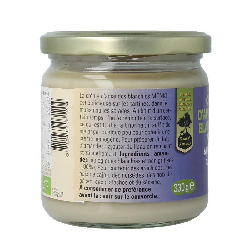 Organic Monki white almond butter spread on bread, 330g jar, natural and eco-friendly almond paste for breakfast or snacks.