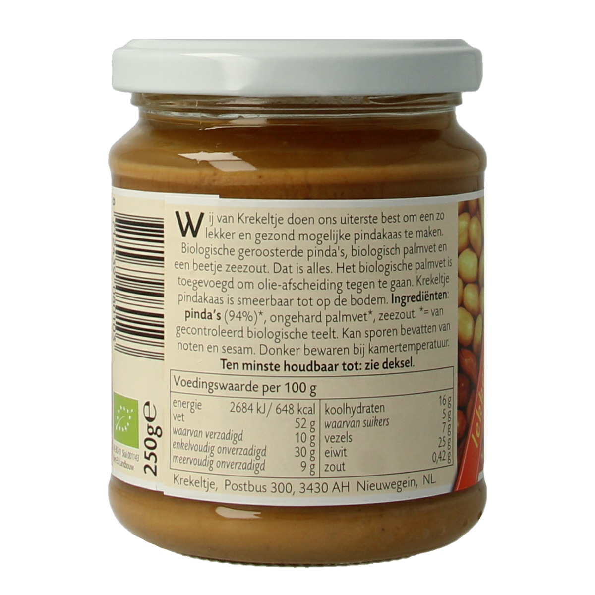 Krekeltje organic peanut butter with salt, 250g, spread on bread, showing jar with label and textured peanut butter inside.