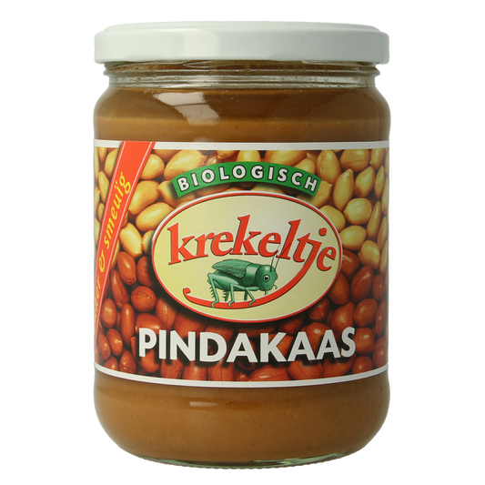 Krekeltje organic peanut butter with salt, 500g jar, natural spread for bread and toast, showcasing the label and jar lid.