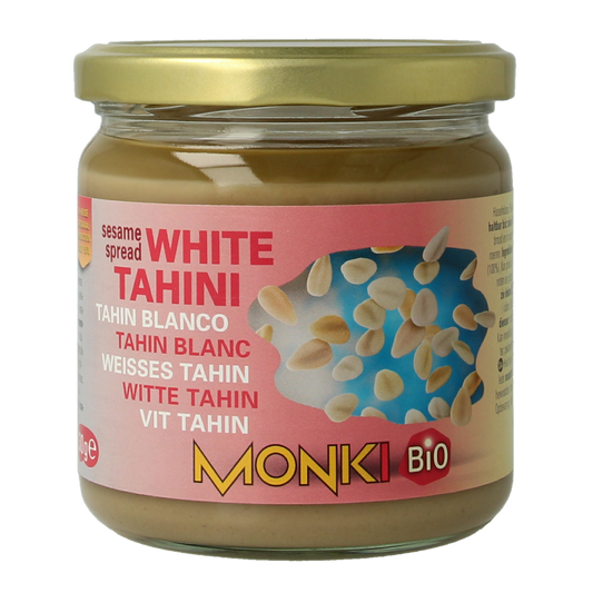 Monki Witte Tahin bio 330g jar of organic white tahini spread, with a smooth, creamy texture and label showing brand and product details.