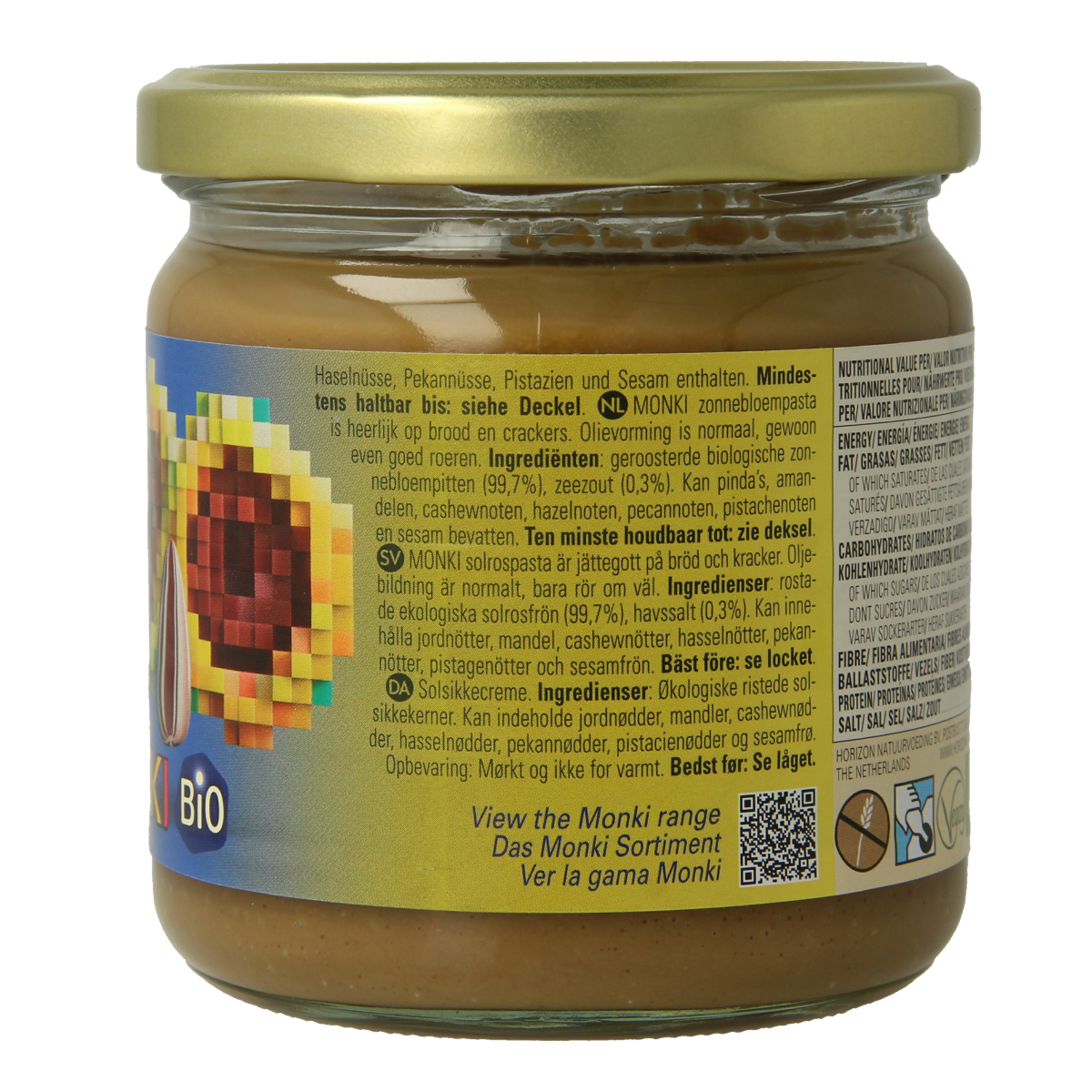 Organic Monki sunflower seed paste spread on bread in a jar, 330g, natural and nutritious breakfast or snack option.