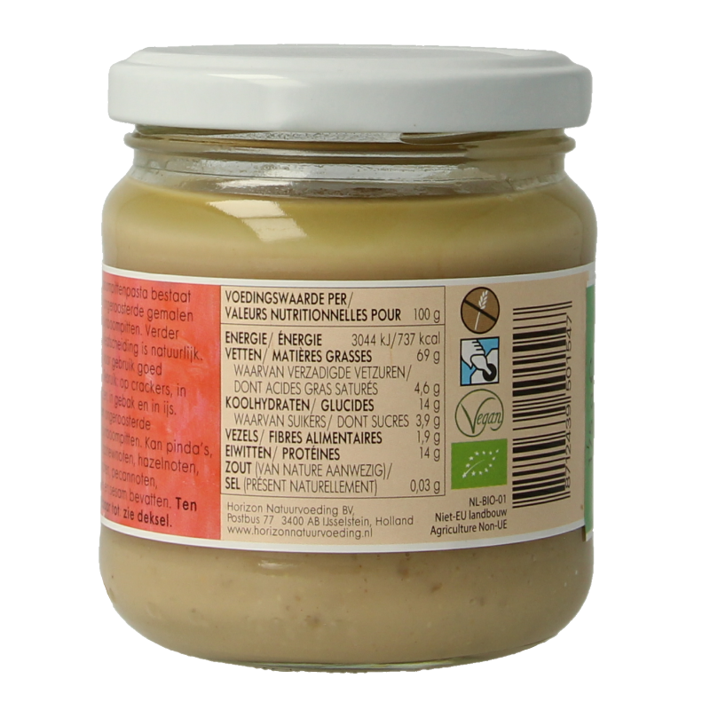 Horizon Bio Pijnboompit pasta spread on bread, close-up view of the 175g jar with a spoon and bread slice.