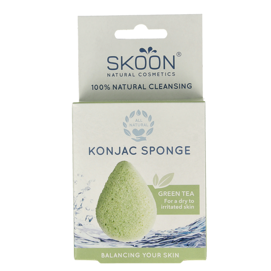 Skoon Konjac sponge with green tea for facial cleansing, natural bio skincare, soft texture, ideal for gentle exfoliation.