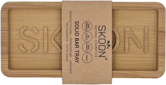 Skoon Solid bamboo bathroom and toilet soap bars, two bars side by side in a natural setting, eco-friendly personal care product