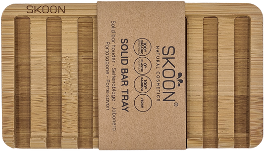 Skoon bamboo solid bar tray holding two soap bars, designed for bathroom and toilet use, natural bamboo finish.