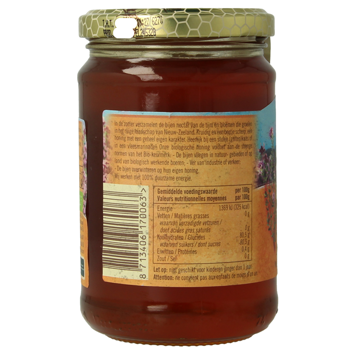 de Traay organic thyme honey with flowers, 350g jar showing honey and floral elements in the image