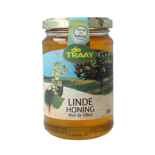 De Traay Linde honing jar, 350 grams, with a clear glass container and gold-colored lid, showcasing natural honey inside.