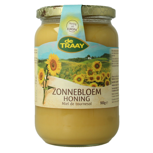 De Traay Zonnebloem honing in a 900g jar, showcasing golden, thick honey with a natural sunflower honey appearance.