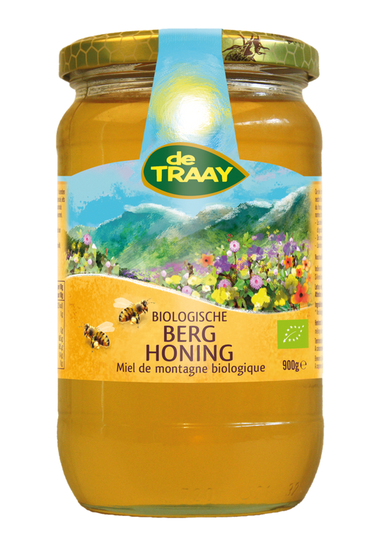 de Traay bio honning in a 900g jar, natural honey with a rich, golden color and textured surface from the de Traay brand