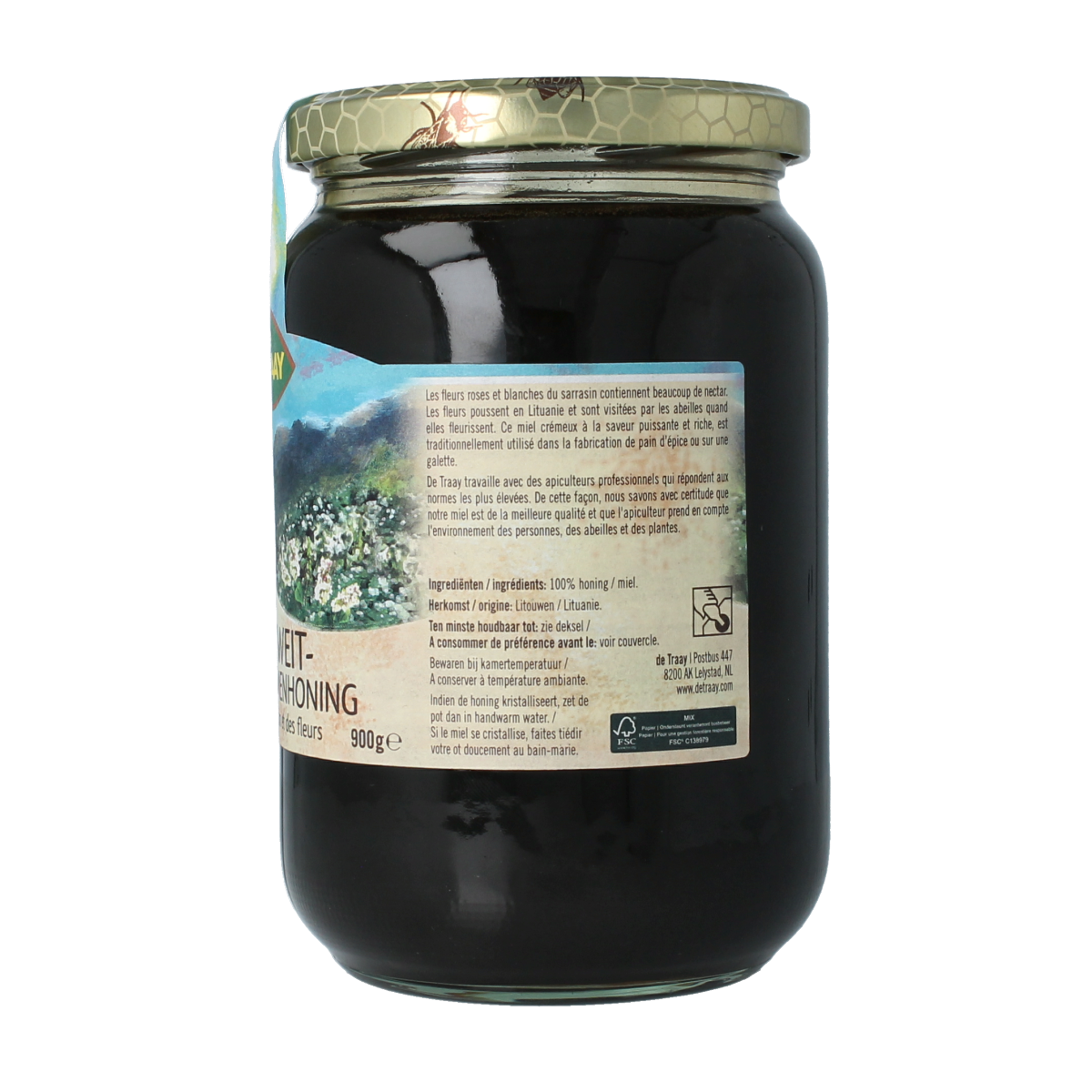 De Traay boekweithoning with flowers, 900g jar, showcasing the honey’s dark color and floral infusion in a clear glass jar.