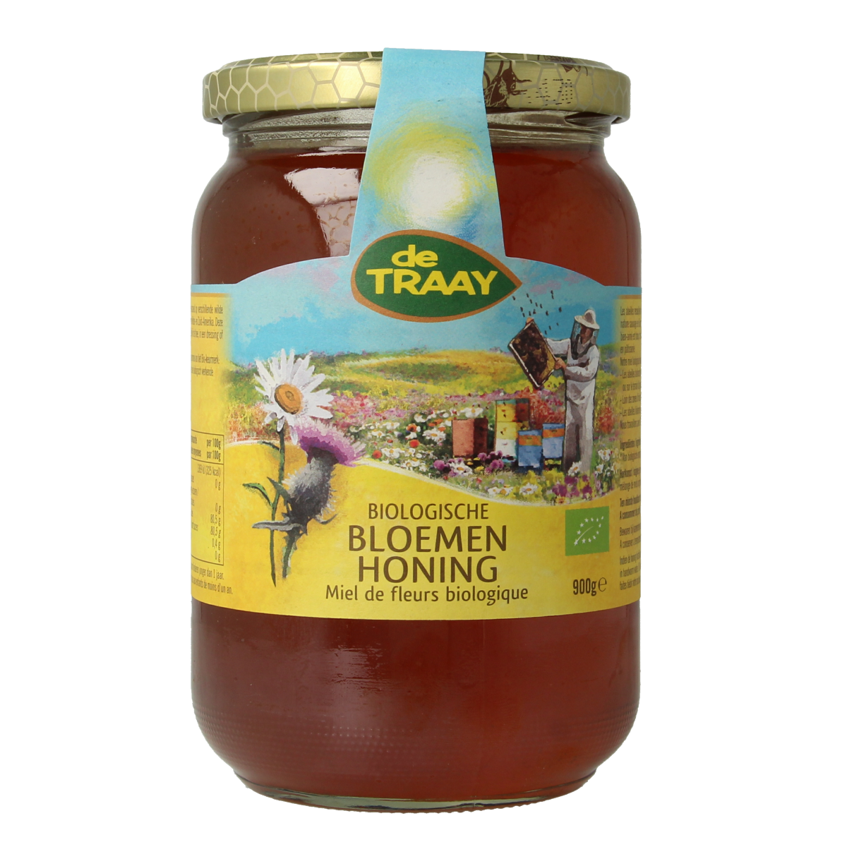 Liquid bio honey from de Traay, 900 grams, showing a jar with golden, viscous honey and fresh flowers in the background.