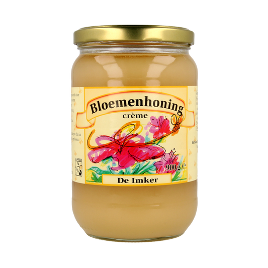 De Imker bloemenhoning crème in 900g jar, smooth honey spread with a natural floral aroma and creamy texture.