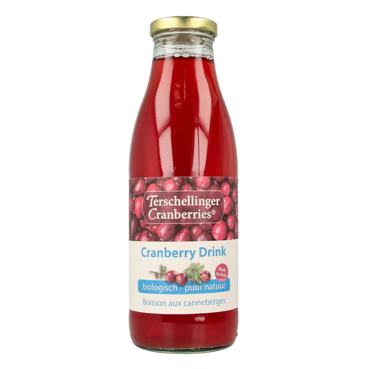 Terschellinger organic cranberry drink in a 750ml bottle, showcasing the vibrant red beverage in a clear glass.