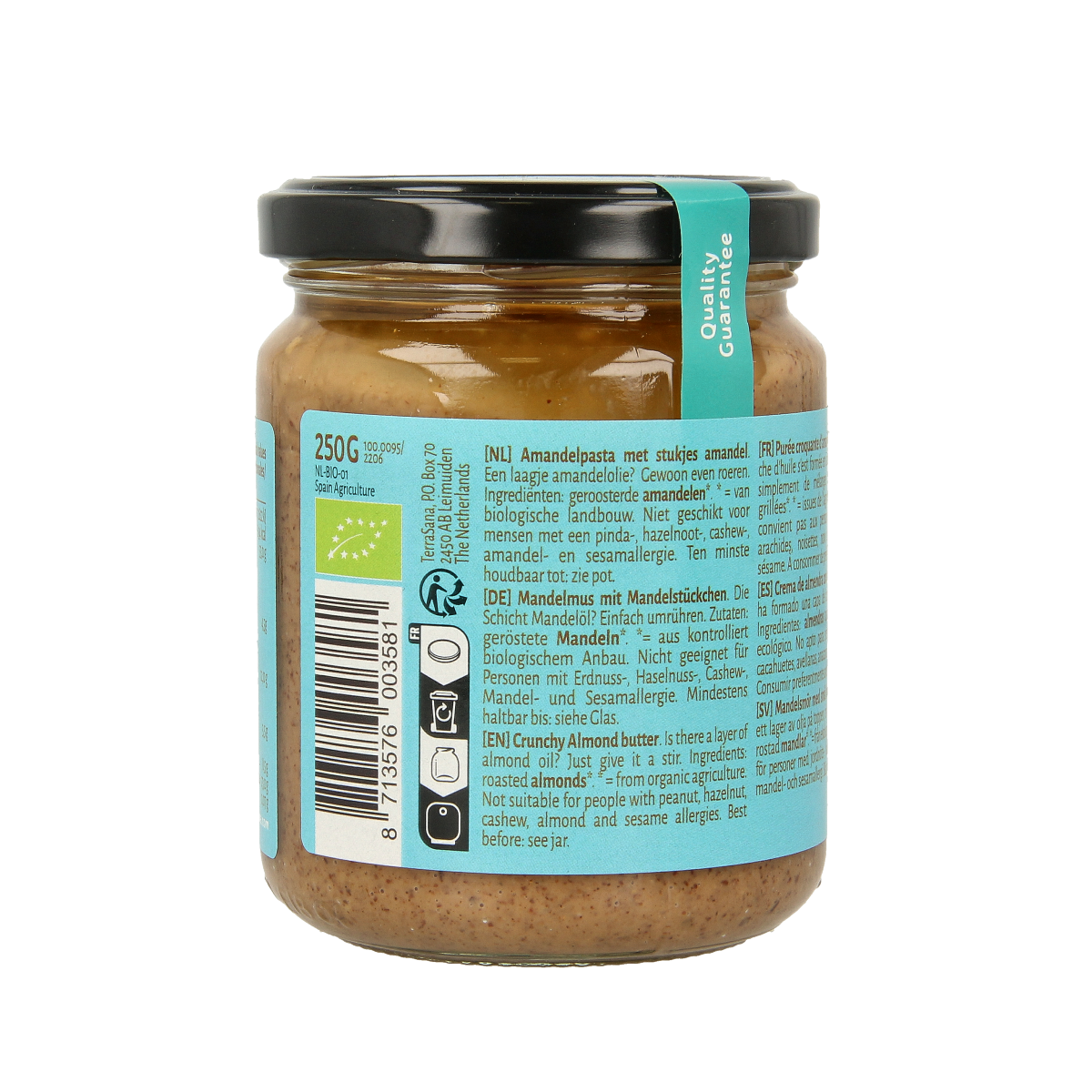 Crunchy organic almond butter spread by TerraSana on whole grain bread, showing its creamy texture and almond pieces.