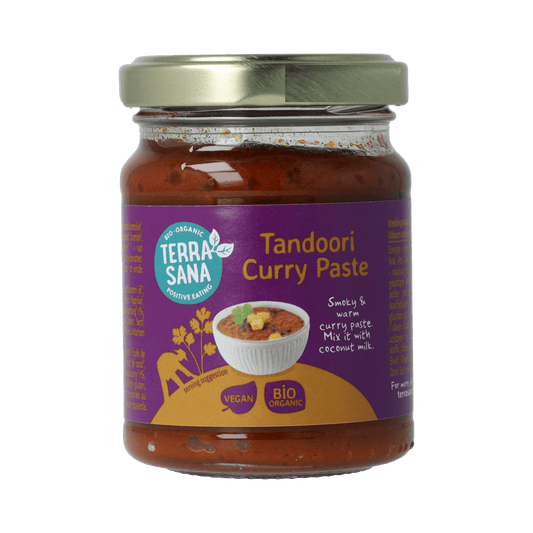 Organic TerraSana Indiase Tandoori Curry Paste in a 130g jar, showing the colorful, spicy paste in a glass jar.