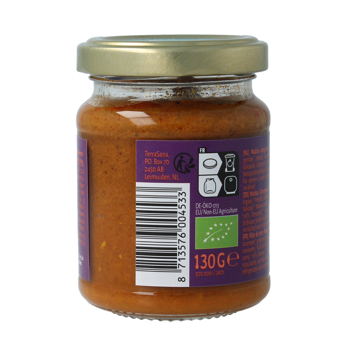 TerraSana Indiase madras currypasta 130g jar with turmeric, spices, and herbs in a glass container for cooking flavorful Indian dishes.