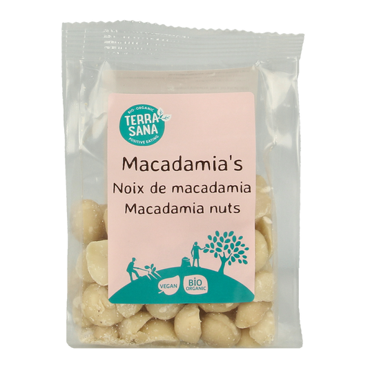 Raw TerraSana macadamianuts, shelled and organic, displayed in a 100g package, showcasing their creamy texture and natural appearance.