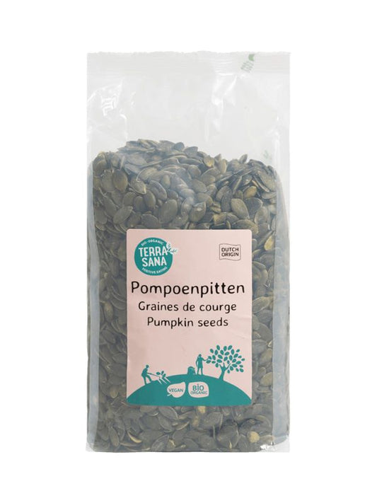 Organic TerraSana pumpkin seeds in a 750g bag, raw and nutrient-rich superfoods, shown in a clear product package.