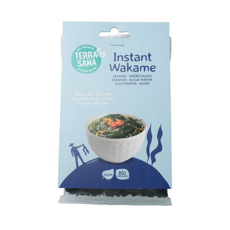 Organic TerraSana Instant Wakame seaweed in a 50g package, featuring dried, rehydrated wakame seaweed with green fronds and packaging label.
