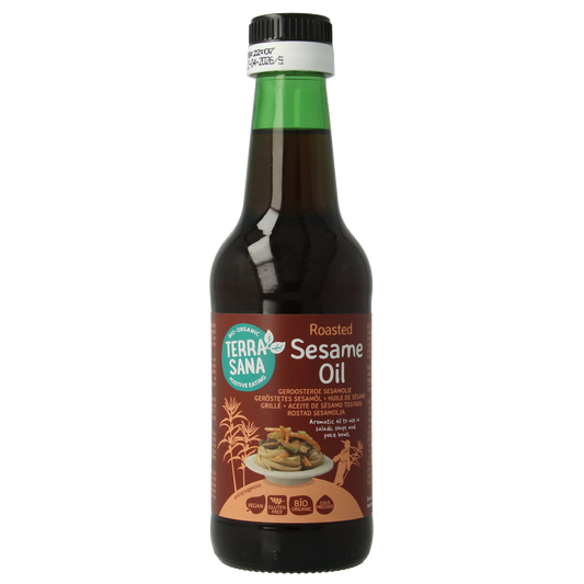 Organic TerraSana toasted sesame oil in a 250ml bottle, highlighting the amber-colored oil and branding on the label.