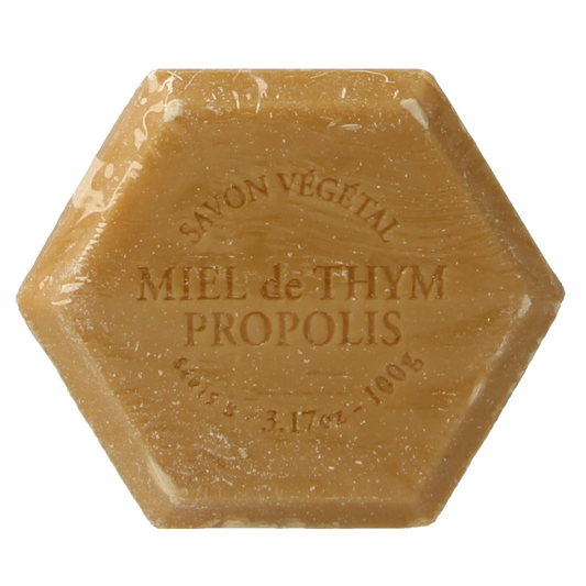 Michel Merlet honing propolis thyme soap bar, natural skincare product, showing the soap with textured surface and herbal ingredients.