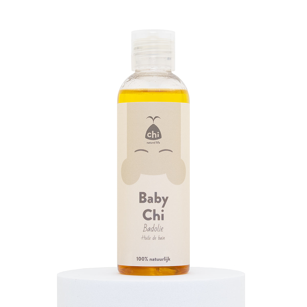 Chi Baby Chi badolie 100ml bottle, gentle baby and toddler care oil, clear container showing the light yellow oil inside.