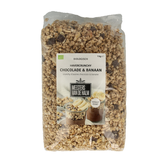 De Halm crunchy havergranola met chocolade en banaan in een grote verpakking, ontbijtgranen in een kleurrijk blik.