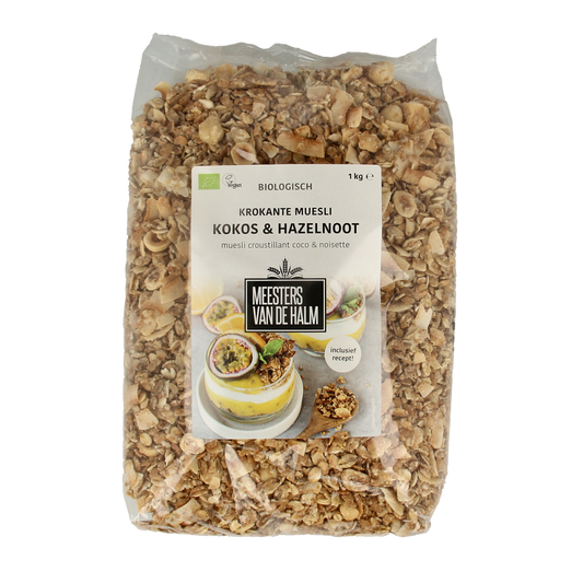 De Halm bio muesli krokant kokos en hazelnoten in 1 kg verpakking, showing crunchy granola with coconut flakes and hazelnuts.