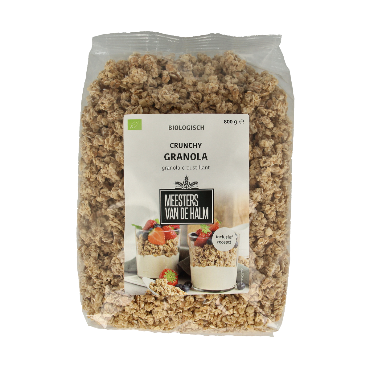 De Halm bio granola breakfast cereal in a clear bowl, showing golden oats and nuts, healthy and natural snack option.