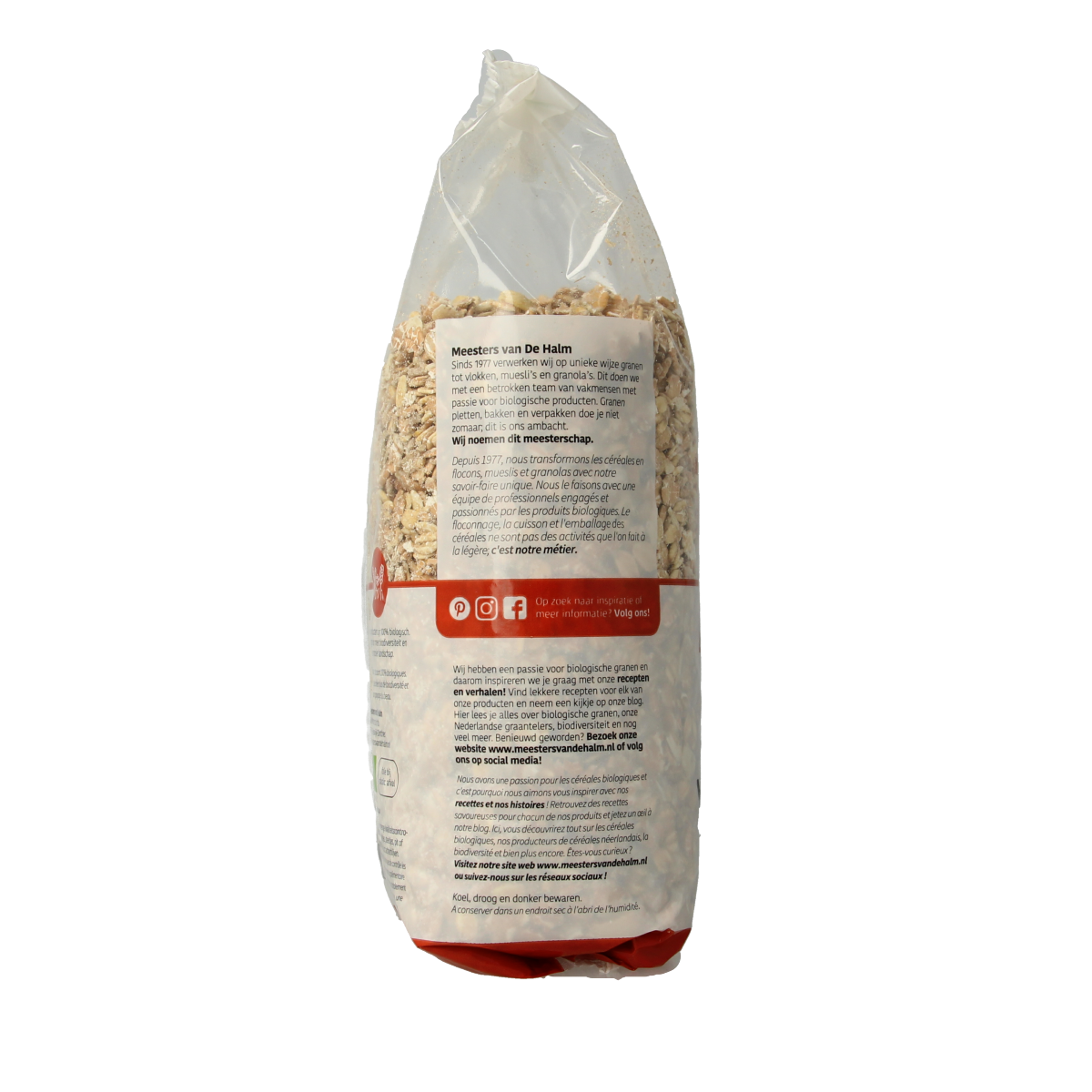 De Halm bio muesli noten ontbijtgranen in 750g package with mixed grains and nuts, displayed in a clear bowl.