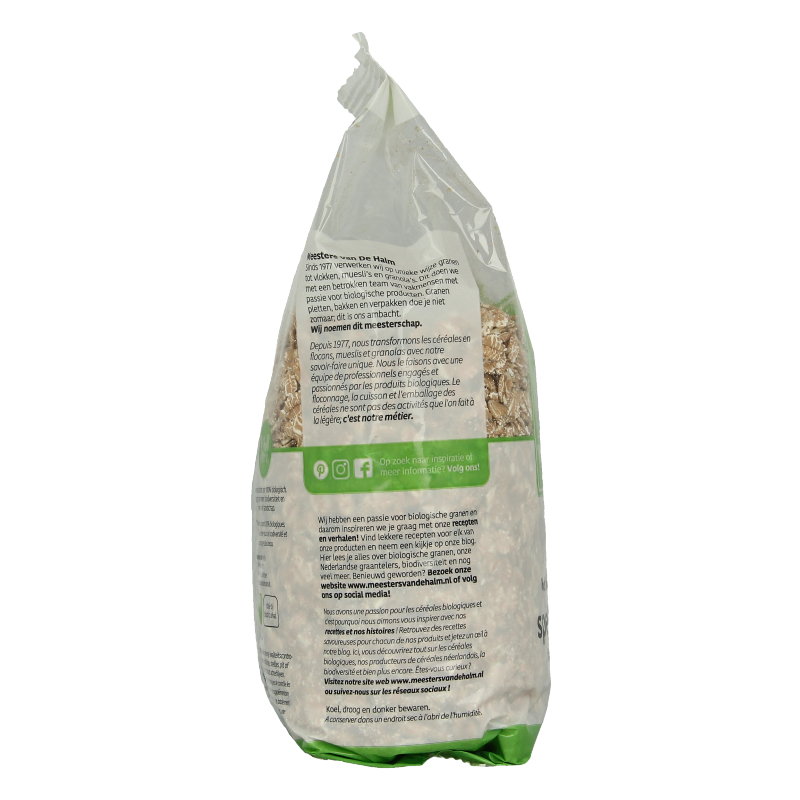 Organic De Halm spelt flakes in a 500g package, showing golden toasted spelt grains for a healthy breakfast.