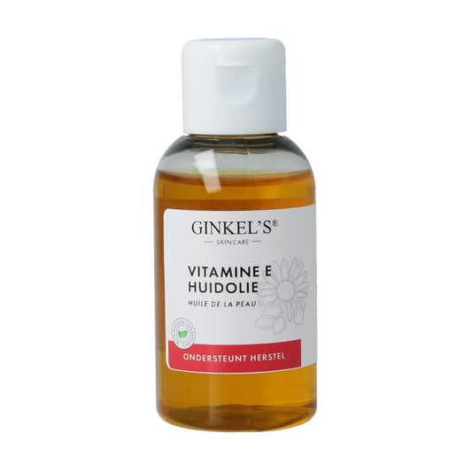Ginkel's Vitamine E huidolie in 50ml bottle, soothing body skincare with nourishing vitamin E, shown in clear container with dropper
