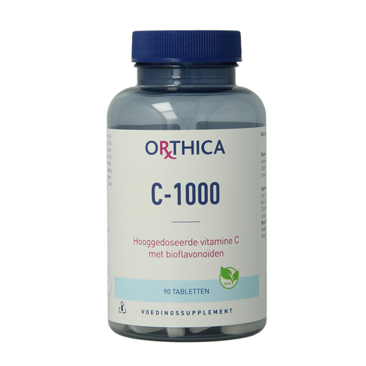 Orthica Vitamine C-1000 tablets in a bottle, showing the supplement's packaging and label on the product.