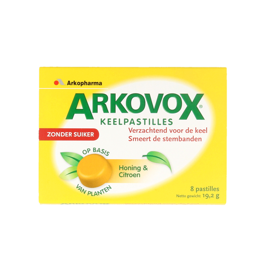 Arkovox Honing citroen keelpastilles in a clear container, showing lemon and honey flavored herbal throat lozenges.