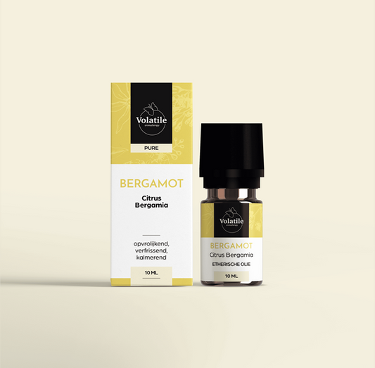 Volatile Bergamot Italy essential oil bottle, 10ml, featuring amber glass and label with product details.