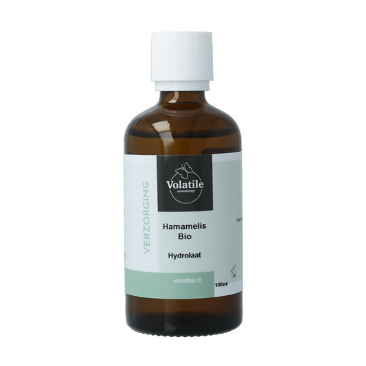 Volatile Hamamelis hydrolat, 100ml, in a clear spray bottle, natural body care product with botanical ingredients.