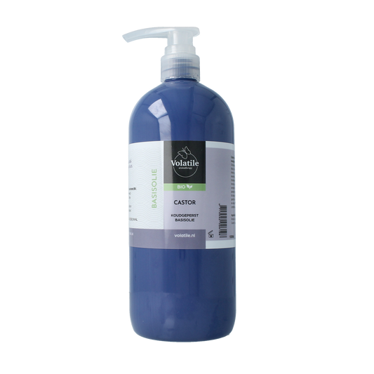 Volatile Castor oil 1-liter bottle for body care, with a clear label and golden cap, on a white background.