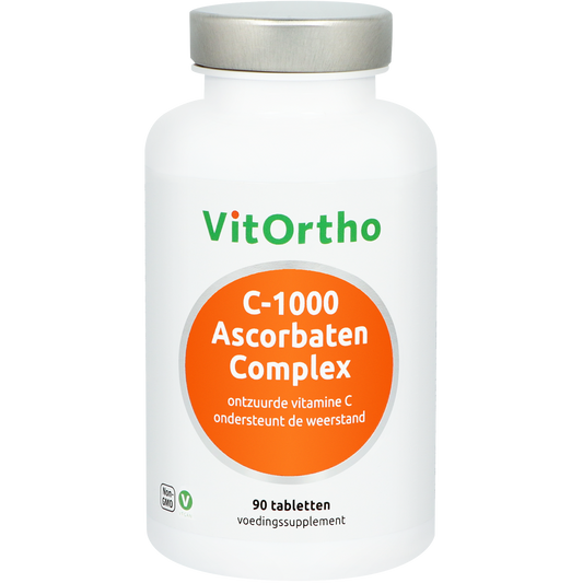 Vitamin C supplement bottle of VitOrtho C-1000 Ascorbaten complex multivitamin tablets, 90 count, with label details visible.