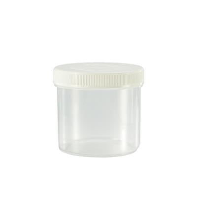 Transparent Spruyt Hillen 120ml instrument tablet flask with white screw cap, shown with multiple flasks in a close-up view.