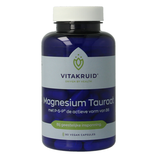 Bottle of Vitakruid Magnesium Tauraat with Vitamin B6 vegetarian capsules, showing the supplement's label and capsules inside the bottle.