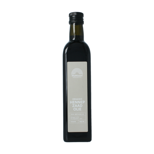 Raw cold-pressed organic hemp seed oil by Mattisson in a 500ml bottle, showing the clear golden oil inside a glass container.