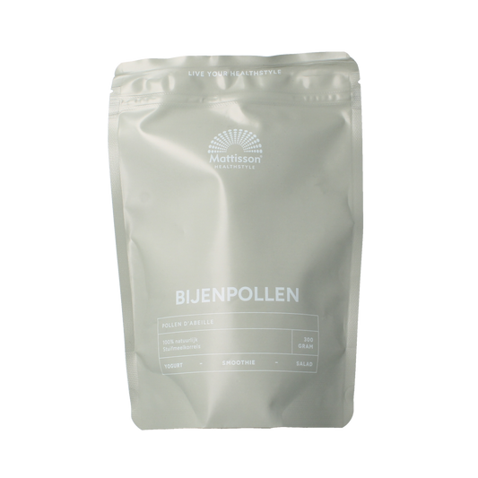 Raw bee pollen granules from Mattisson superfoods, 300g, showing small yellow pollen clusters in a clear container.