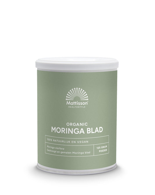 Raw Moringa Oleifera leaf powder in a jar, organic superfood by Mattisson, with a close-up of the green powder.