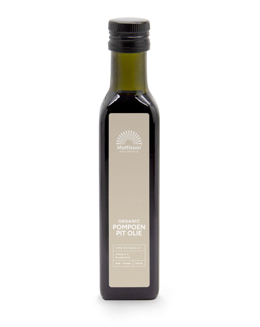 Raw organic pumpkin seed oil by Mattisson in a 250ml bottle, shown in a clear glass container with a dark background.