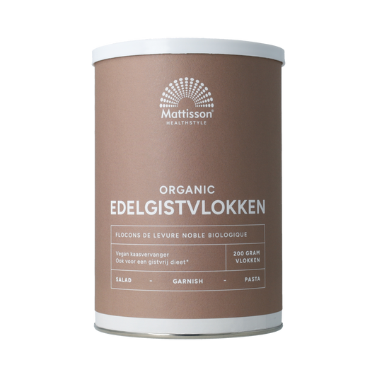 Organic Mattisson Edelgistvlokken, 200g, in a natural baking mix, showing golden flaxseed flakes in a resealable bag.